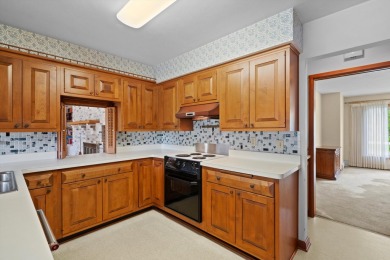 This sprawling Cedar sided w/accents of Lannon stone Ranch is on Whitnall Park Golf Club in Wisconsin - for sale on GolfHomes.com, golf home, golf lot