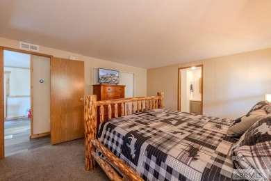 Location, location, location! Just 20 minutes from Yellowstone on Island Park Village Resort Golf Course in Idaho - for sale on GolfHomes.com, golf home, golf lot