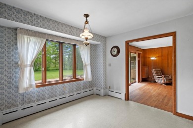 This sprawling Cedar sided w/accents of Lannon stone Ranch is on Whitnall Park Golf Club in Wisconsin - for sale on GolfHomes.com, golf home, golf lot