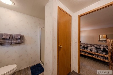 Location, location, location! Just 20 minutes from Yellowstone on Island Park Village Resort Golf Course in Idaho - for sale on GolfHomes.com, golf home, golf lot