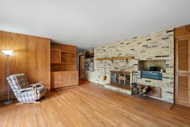 This sprawling Cedar sided w/accents of Lannon stone Ranch is on Whitnall Park Golf Club in Wisconsin - for sale on GolfHomes.com, golf home, golf lot