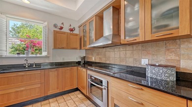 **EXPERIENCE EFFORTLESS LIVING in this BEAUTIFULLY UPDATED on The Oaks Club in Florida - for sale on GolfHomes.com, golf home, golf lot