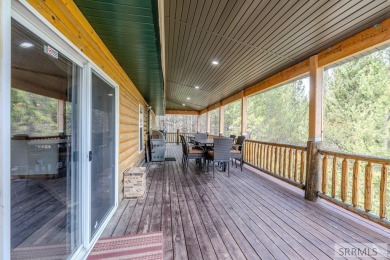 Location, location, location! Just 20 minutes from Yellowstone on Island Park Village Resort Golf Course in Idaho - for sale on GolfHomes.com, golf home, golf lot