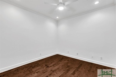 This first-floor residence offers convenient dual entrances - on Wilmington Island Club in Georgia - for sale on GolfHomes.com, golf home, golf lot