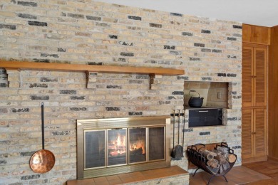 This sprawling Cedar sided w/accents of Lannon stone Ranch is on Whitnall Park Golf Club in Wisconsin - for sale on GolfHomes.com, golf home, golf lot