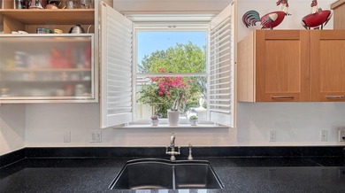 **EXPERIENCE EFFORTLESS LIVING in this BEAUTIFULLY UPDATED on The Oaks Club in Florida - for sale on GolfHomes.com, golf home, golf lot