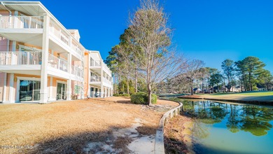 You'll love this 2 bedroom, 2 bath upper condo with a spacious on Brunswick Plantation and Golf Resorts in North Carolina - for sale on GolfHomes.com, golf home, golf lot