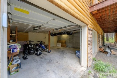 Location, location, location! Just 20 minutes from Yellowstone on Island Park Village Resort Golf Course in Idaho - for sale on GolfHomes.com, golf home, golf lot