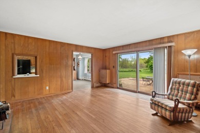 This sprawling Cedar sided w/accents of Lannon stone Ranch is on Whitnall Park Golf Club in Wisconsin - for sale on GolfHomes.com, golf home, golf lot