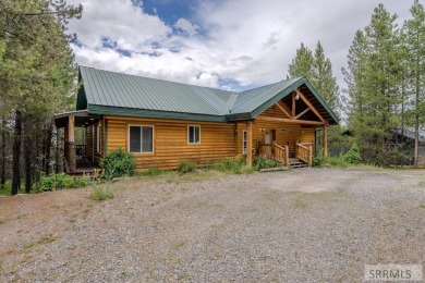 Location, location, location! Just 20 minutes from Yellowstone on Island Park Village Resort Golf Course in Idaho - for sale on GolfHomes.com, golf home, golf lot
