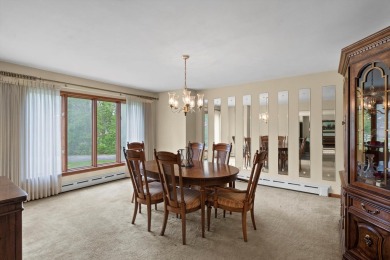 This sprawling Cedar sided w/accents of Lannon stone Ranch is on Whitnall Park Golf Club in Wisconsin - for sale on GolfHomes.com, golf home, golf lot
