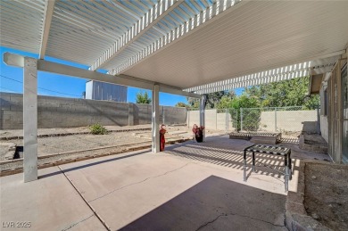 This lovely 3BD, 2BA, 2CAR mid-century Home with a modern flare on Las Vegas National Golf Club in Nevada - for sale on GolfHomes.com, golf home, golf lot