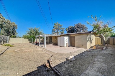 This lovely 3BD, 2BA, 2CAR mid-century Home with a modern flare on Las Vegas National Golf Club in Nevada - for sale on GolfHomes.com, golf home, golf lot