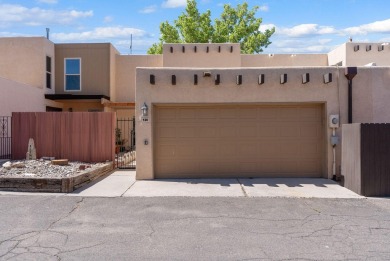 Beautifully Updated Townhouse located in the Villa Encantada on Arroyo Del Oso Golf Course in New Mexico - for sale on GolfHomes.com, golf home, golf lot