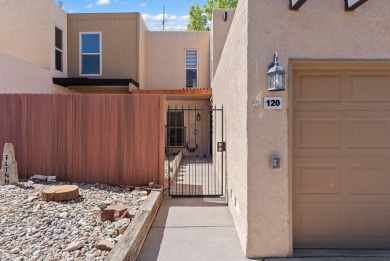 Beautifully Updated Townhouse located in the Villa Encantada on Arroyo Del Oso Golf Course in New Mexico - for sale on GolfHomes.com, golf home, golf lot