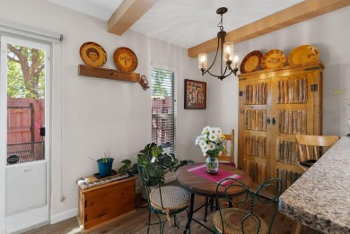 Beautifully Updated Townhouse located in the Villa Encantada on Arroyo Del Oso Golf Course in New Mexico - for sale on GolfHomes.com, golf home, golf lot