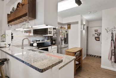 Beautifully Updated Townhouse located in the Villa Encantada on Arroyo Del Oso Golf Course in New Mexico - for sale on GolfHomes.com, golf home, golf lot