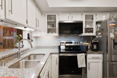 Beautifully Updated Townhouse located in the Villa Encantada on Arroyo Del Oso Golf Course in New Mexico - for sale on GolfHomes.com, golf home, golf lot