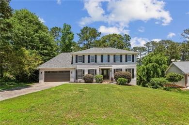 Tucked away on a large (over 1/2 acre lot) in the heart of on Indian Hills Country Club in Georgia - for sale on GolfHomes.com, golf home, golf lot