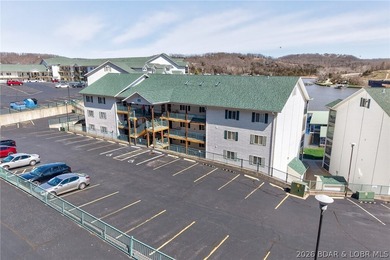 Waterfront walk-in unit with just a few steps at Cedar Heights on The Club At Old Kinderhook in Missouri - for sale on GolfHomes.com, golf home, golf lot