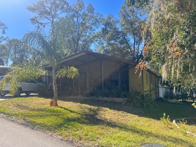 Discover this beautifully maintained two bedroom two bathroom on Whisperwood Golf Course in Florida - for sale on GolfHomes.com, golf home, golf lot