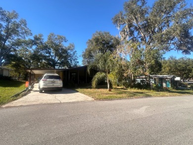 Discover this beautifully maintained two bedroom two bathroom on Whisperwood Golf Course in Florida - for sale on GolfHomes.com, golf home, golf lot