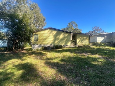 Discover this beautifully maintained two bedroom two bathroom on Whisperwood Golf Course in Florida - for sale on GolfHomes.com, golf home, golf lot