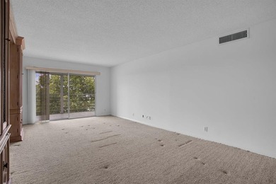 Corner residence offering stunning water views from every window on Wynmoor Golf Course in Florida - for sale on GolfHomes.com, golf home, golf lot