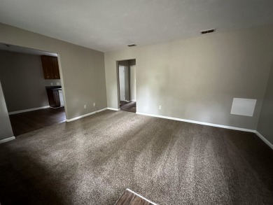 2Bed/1bath Quad overlooking Hilamin Golf Course fully on Hilaman Park Golf Course in Florida - for sale on GolfHomes.com, golf home, golf lot
