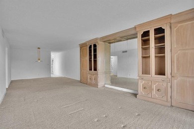 Corner residence offering stunning water views from every window on Wynmoor Golf Course in Florida - for sale on GolfHomes.com, golf home, golf lot