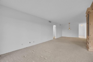 Corner residence offering stunning water views from every window on Wynmoor Golf Course in Florida - for sale on GolfHomes.com, golf home, golf lot