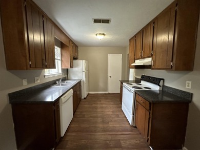 2Bed/1bath Quad overlooking Hilamin Golf Course fully on Hilaman Park Golf Course in Florida - for sale on GolfHomes.com, golf home, golf lot