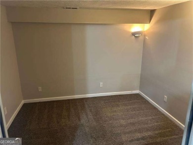 This charming 4-bedroom 3-bath home is perfect for a growing on Hidden Hills Country Club in Georgia - for sale on GolfHomes.com, golf home, golf lot