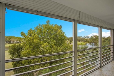 Corner residence offering stunning water views from every window on Wynmoor Golf Course in Florida - for sale on GolfHomes.com, golf home, golf lot