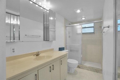 Corner residence offering stunning water views from every window on Wynmoor Golf Course in Florida - for sale on GolfHomes.com, golf home, golf lot