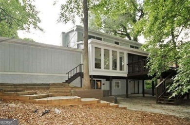 This charming 4-bedroom 3-bath home is perfect for a growing on Hidden Hills Country Club in Georgia - for sale on GolfHomes.com, golf home, golf lot