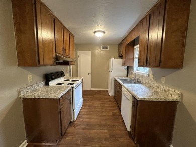 2Bed/1bath Quad overlooking Hilamin Golf Course fully on Hilaman Park Golf Course in Florida - for sale on GolfHomes.com, golf home, golf lot