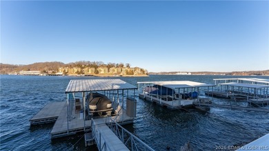 Beautifully updated lakefront home at the 3MM in the highly on Seasons Ridge At Four Seasons in Missouri - for sale on GolfHomes.com, golf home, golf lot