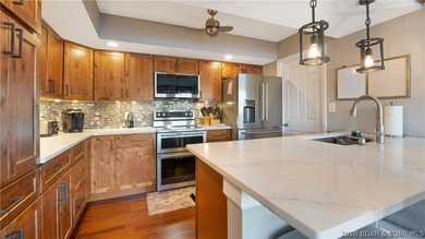 Beautifully updated lakefront home at the 3MM in the highly on Seasons Ridge At Four Seasons in Missouri - for sale on GolfHomes.com, golf home, golf lot