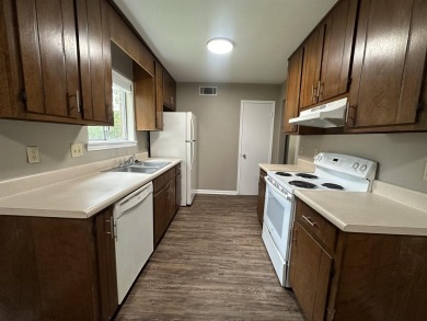 2Bed/1bath Quad overlooking Hilamin Golf Course fully on Hilaman Park Golf Course in Florida - for sale on GolfHomes.com, golf home, golf lot