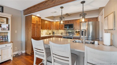 Beautifully updated lakefront home at the 3MM in the highly on Seasons Ridge At Four Seasons in Missouri - for sale on GolfHomes.com, golf home, golf lot