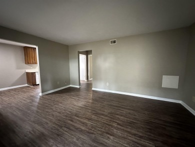 2Bed/1bath Quad overlooking Hilamin Golf Course fully on Hilaman Park Golf Course in Florida - for sale on GolfHomes.com, golf home, golf lot