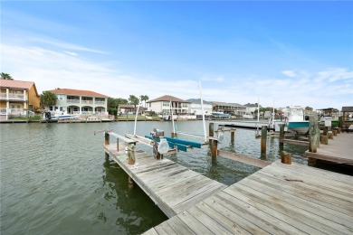 Welcome to this stunning canal-front home in the highly on Palmilla Beach Golf Club in Texas - for sale on GolfHomes.com, golf home, golf lot