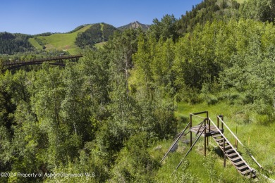 Discover Maroon Creek Lot 16, an exclusive 2.3-acre ski-in on Maroon Creek Club in Colorado - for sale on GolfHomes.com, golf home, golf lot