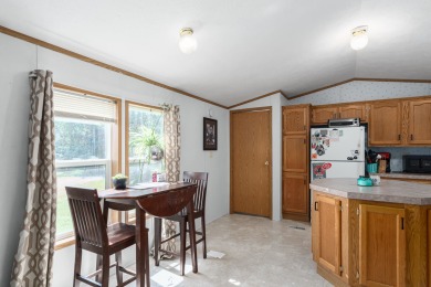 Discover a charming retreat nestled on 2.83 acres of serene on Sand Valley Golf Course in Wisconsin - for sale on GolfHomes.com, golf home, golf lot