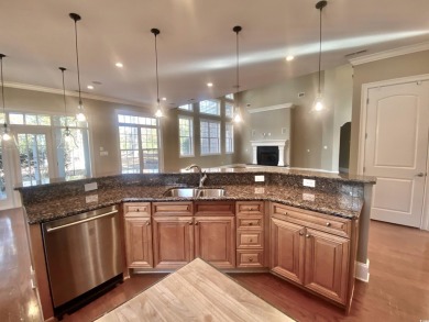 This spacious traditional home has volume ceilings throughout on Heron Point Golf Club in South Carolina - for sale on GolfHomes.com, golf home, golf lot