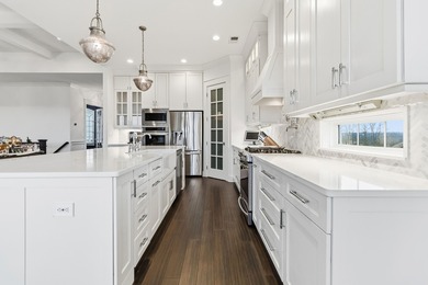 Experience refined luxury in this custom-built home in the on The Bull At Boones Trace in Kentucky - for sale on GolfHomes.com, golf home, golf lot