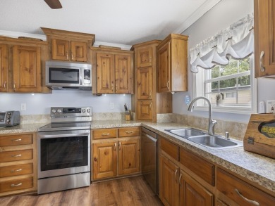 Built in 2017, this gorgeous 3/2 residence features beautiful on Barefoot Bay Golf Course in Florida - for sale on GolfHomes.com, golf home, golf lot