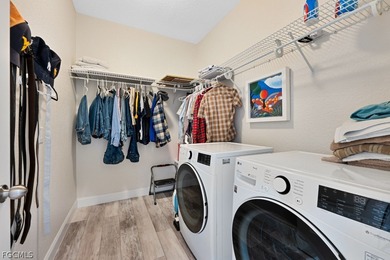 Nestled west of US-41 in the coveted, gated enclave of Fountain on Pelican Sound Golf and River Club in Florida - for sale on GolfHomes.com, golf home, golf lot