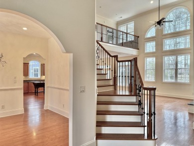 This spacious traditional home has volume ceilings throughout on Heron Point Golf Club in South Carolina - for sale on GolfHomes.com, golf home, golf lot